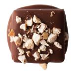 Milk Chocolate Hazelnut 'Gianduja' - a classic Italian infusion of chocolate and ground hazelnuts - overwhelmingly nutty and milky, coated in more chopped hazelnuts, and enrobed in lush organic milk chocolate