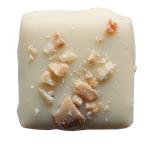 Raisin Toasted Almond Truffle: Hand-toasted almonds fused with plump raisin p and a creamy white chocolate ganache